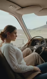 a woman sitting in the passenger seat of a car