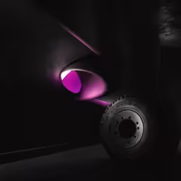 a tire with a bright light shining in the dark
