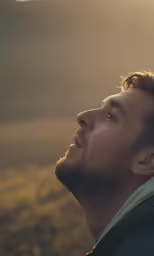 a man that is looking up at something