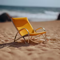 yellow chair in the sand on the beach