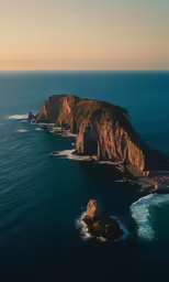 aerial view of a big cliff near the ocean