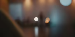 blurry image of a hallway with different colored lights
