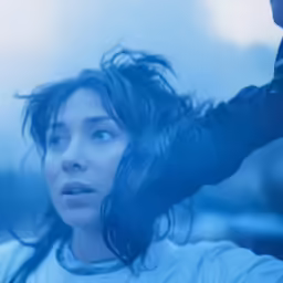 the person is holding onto another persons arm
