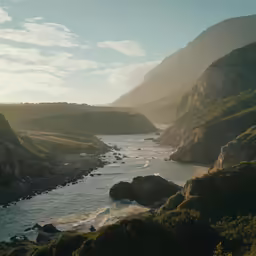 a picture of water in a large bay with cliffs