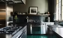 an image of a kitchen setting with green tile floor