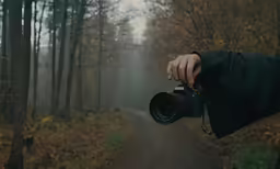 the camera person is taking a photo of a path