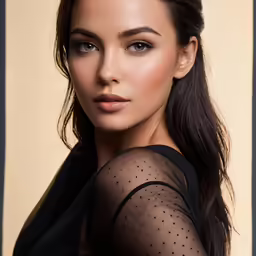 a woman is posing for the camera wearing a sheer dress