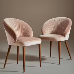 two modern style chairs are shown in the studio