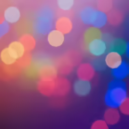many colored lights on a blue, purple, and red background
