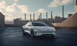 the white electric vehicle is driving through an empty parking lot