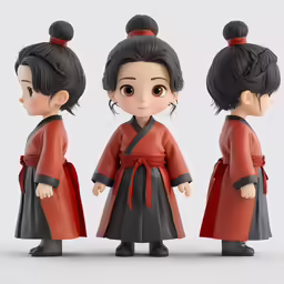 a couple of small dolls in red and black outfits