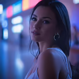 a girl is shown from the side looking out