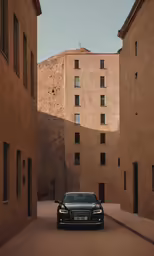 a suv is parked in the middle of some buildings