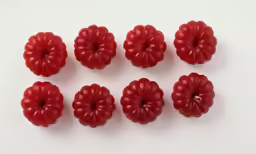 the four raspberries have their edges removed