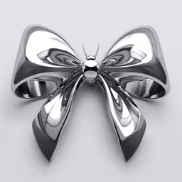 a bow made out of silver steel on a white surface