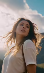 woman with long hair posing in the sun