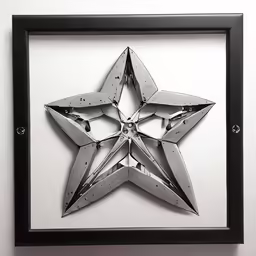 a metal star hanging on a wall