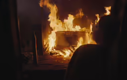 a fire burning in the dark with flames