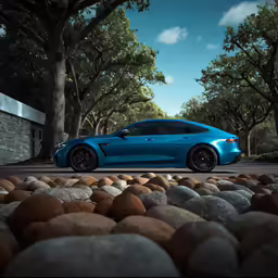 the blue sports car is parked next to a lot of rocks