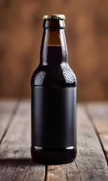 a brown and black beer bottle on wooden surface