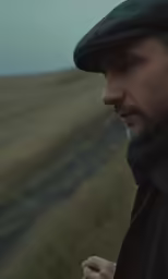 there is a man standing in front of the desert