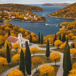 a church on top of a hill with trees