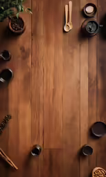 a wood table topped with a vase filled with flowers