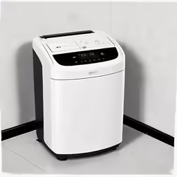 a small white electric breadmaker is in a corner