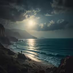 a couple stands on the beach watching the sun set
