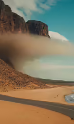 an image of a desert with a road going past it