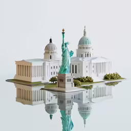 two statues are displayed in front of some buildings