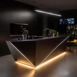 a modern kitchen with a large counter top