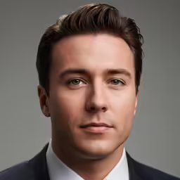 a professional portrait photograph of a man with blue eyes