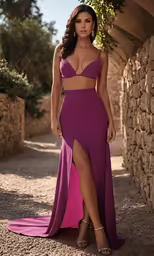 woman in purple and pink prom dress with slit
