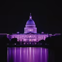a large building with some lights on top of it