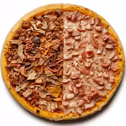 a half eaten pizza with different toppings sitting on a white surface