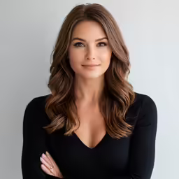 the smiling woman is posing for a photo
