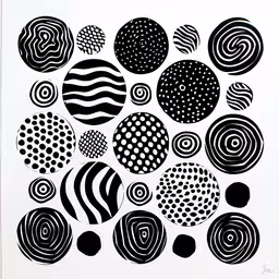 a print depicting black and white dots,black and white artwork on paper of circles