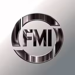 the word fmg on a metallic background,the fm logo is in a circle with a dark background
