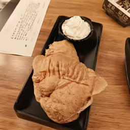 a large tray with a sandwich on top of it