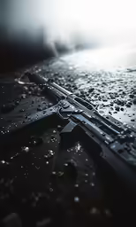 water drops scattered all over a black surface and a cross