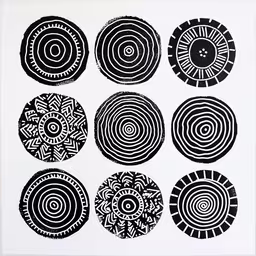 an art print that shows different shapes and sizes,nine black and white circles on a white background