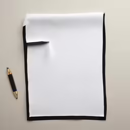 an empty piece of paper is shown with a pen