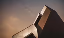 a tall building with a tower made out of metal