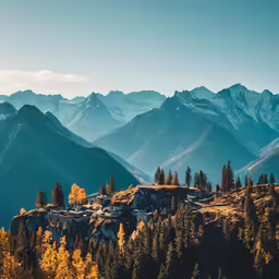 a beautiful view of mountains and some buildings