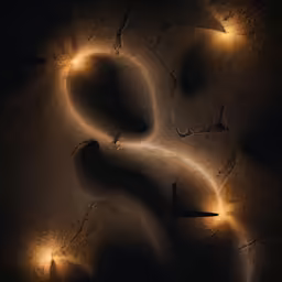 a group of lights are shining on a wall