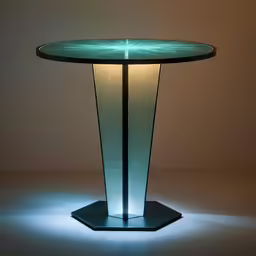 an unusual shaped table has a green light coming from the top