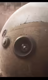 a close - up photo of a round object with holes in the center