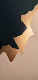 the sun is reflected in the sand that makes it look like it has two large hills