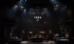 dark stage lighting in front of seating area